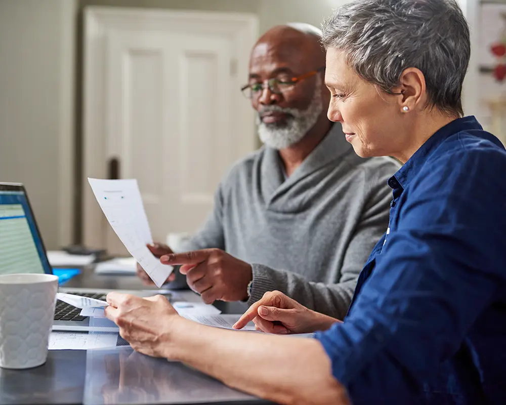 older couple looking at laptop